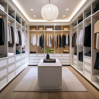 Woman sitting in walk-in closet with hangers and clothes storage