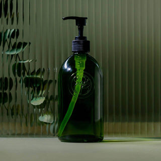 Apothecary recycled glass soap dispenser with pump, elegant design, eco-friendly, ready for Koala Eco products.