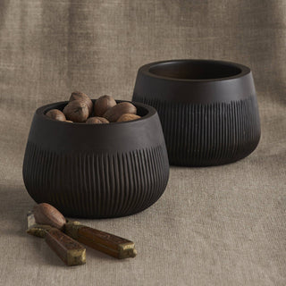 Chiseled Leila Bowl set with nuts, showcasing hand-carved design and unique dark stain, ideal for snacks.